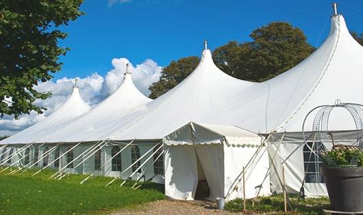 high-quality portable toilets stationed at a wedding, meeting the needs of guests throughout the outdoor reception in Aurora, OR